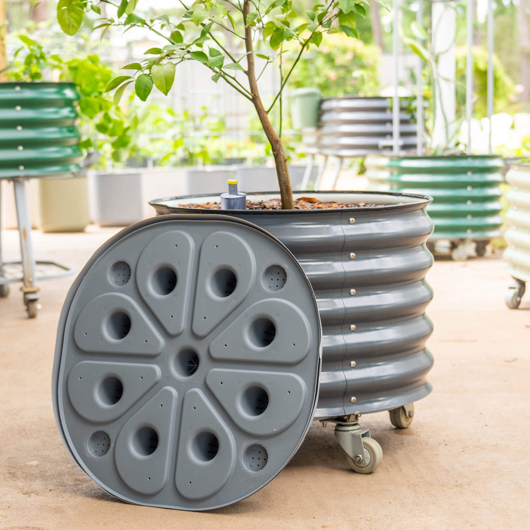 rolling self watering tomato planter and rust resistant tower Self-Watering Rolling Citrus Tree Planter 30 Gallon